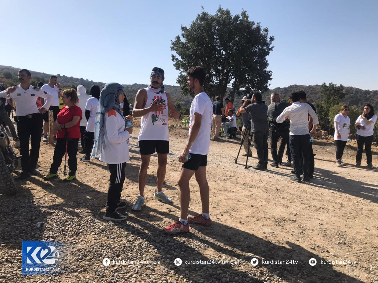 Male and female mountain runners are pictured before undertaking skyrunning, Sept. 24, 2021. (Photo: Hero Mewludi/Kurdistan24)